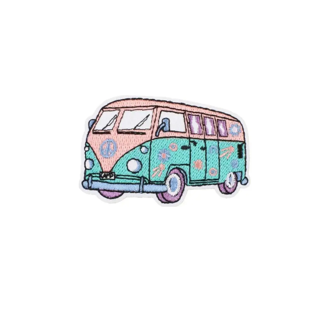 A colorful embroidered patch featuring a vintage volkswagen van with a pink front and teal body, adorned with floral patterns and peace signs.