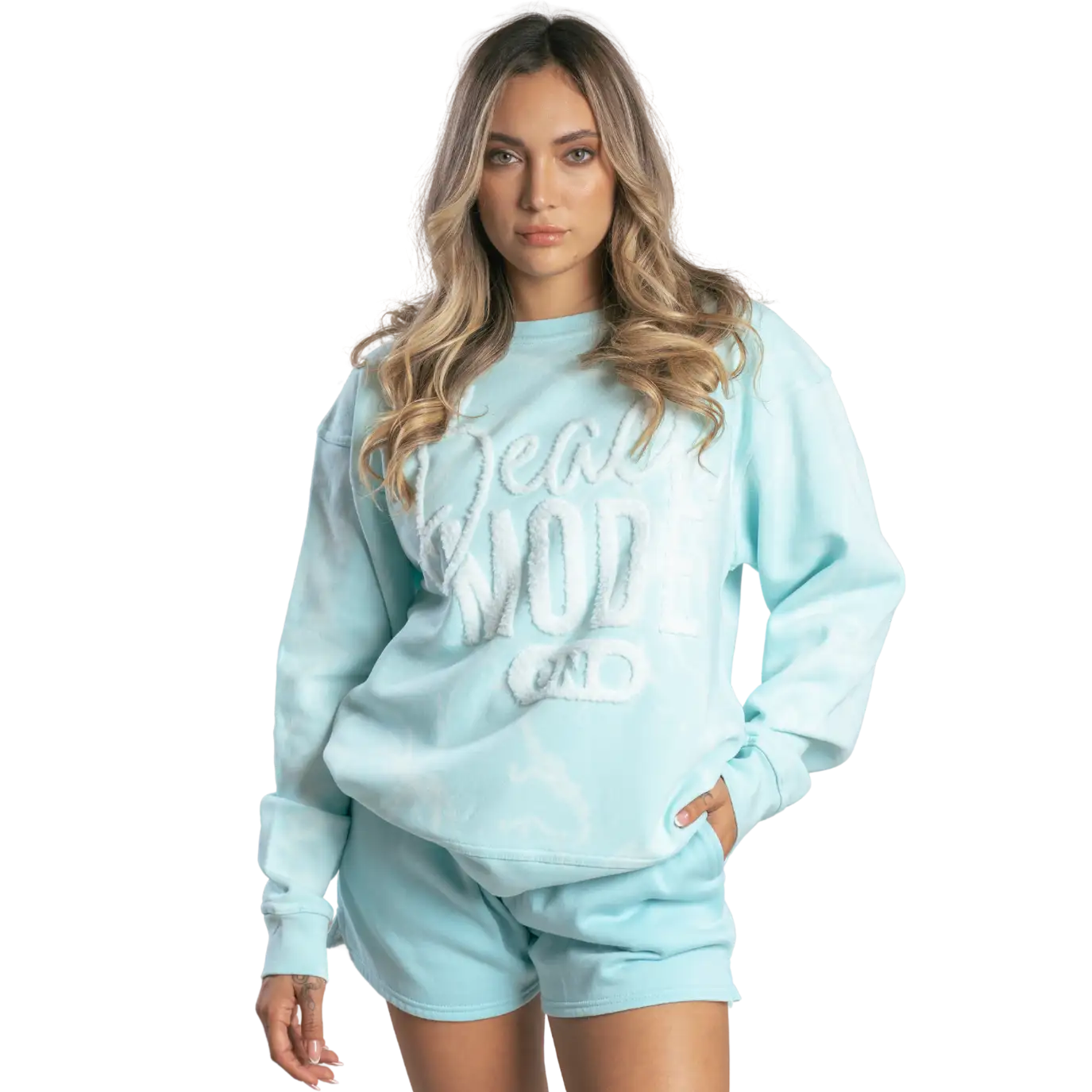 Light blue oversized sweatshirt with ’deal mode on’ embroidered in white.